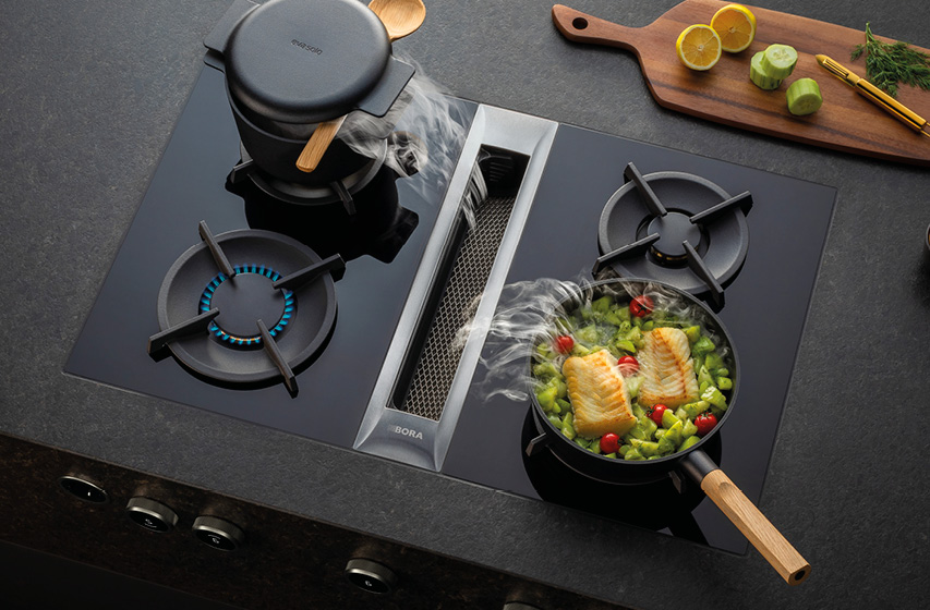 Bora Gaskochfeld mit integriertem Dunstabzug saugt Dampf beim Kochen ab