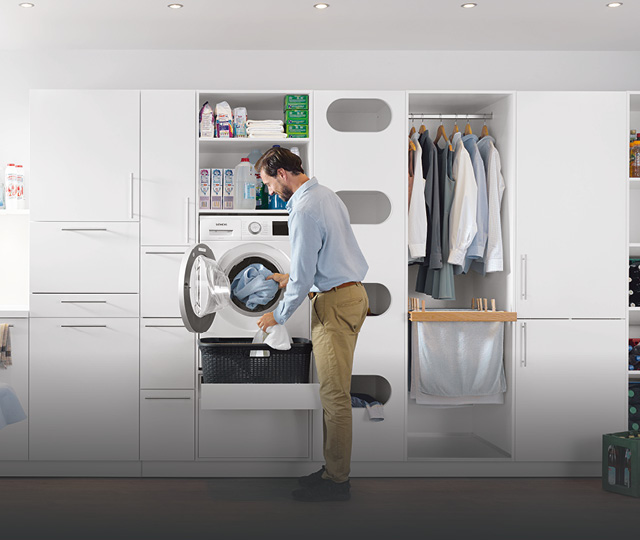 Hauswirtschaftsraum mit Waschmaschine, Stauraum und Kleiderschrank, Teaserlink