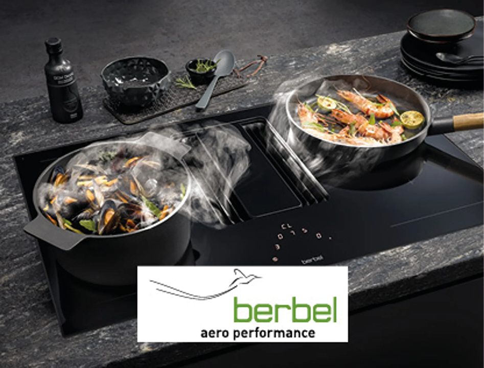 berbel Kochfeld mit integriertem Dunstabzug und Kochgeschirr. Moderne Kochfeldlüftung für offene Küchen und hochwertige Einbauküchen mit innovativer Küchentechnik.