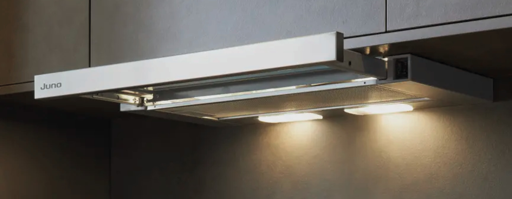 Ausziehbarer Dunstabzug mit Licht, Schriftzug Juno links und contur MODERN KITCHEN DESIGN rechts